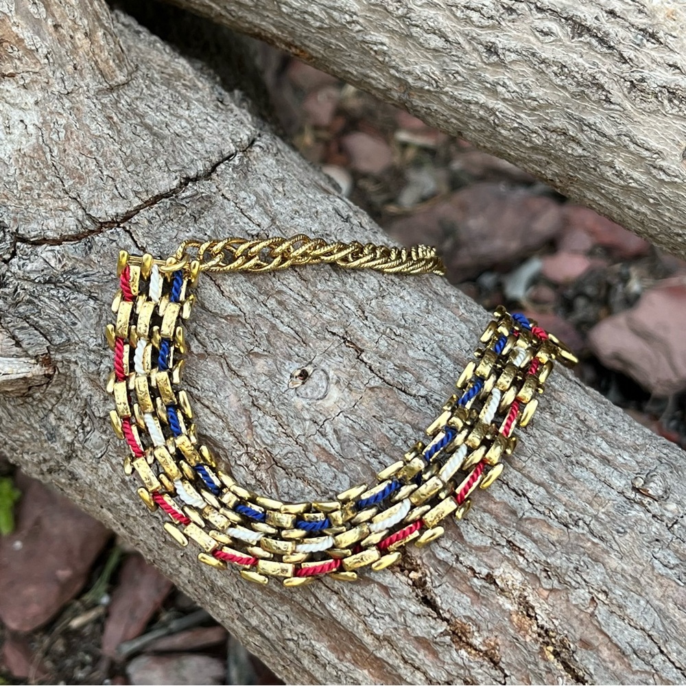 Louise Manna American Flag Gold Bracelet with Red, White and Blue silk thread.